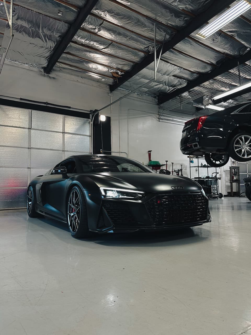 EuroComp Garage shop interior with European vehicles